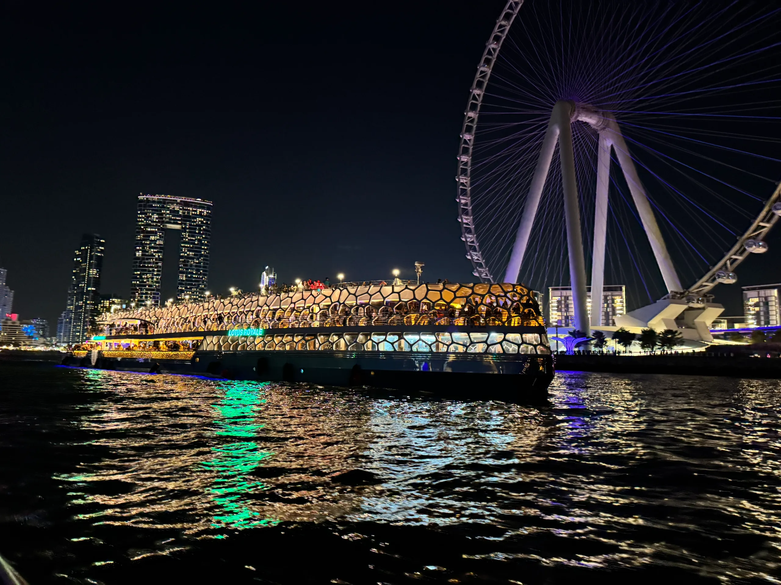 Lotus Mega Yacht Dinner Cruise in Dubai Marina Promenade next to Marina Mall. — book with Flyout Tours